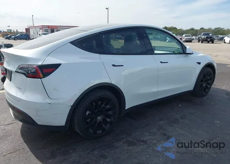 2023 Tesla Model Y из США, поврежденный, VIN 7SAYGAEE9PF792088